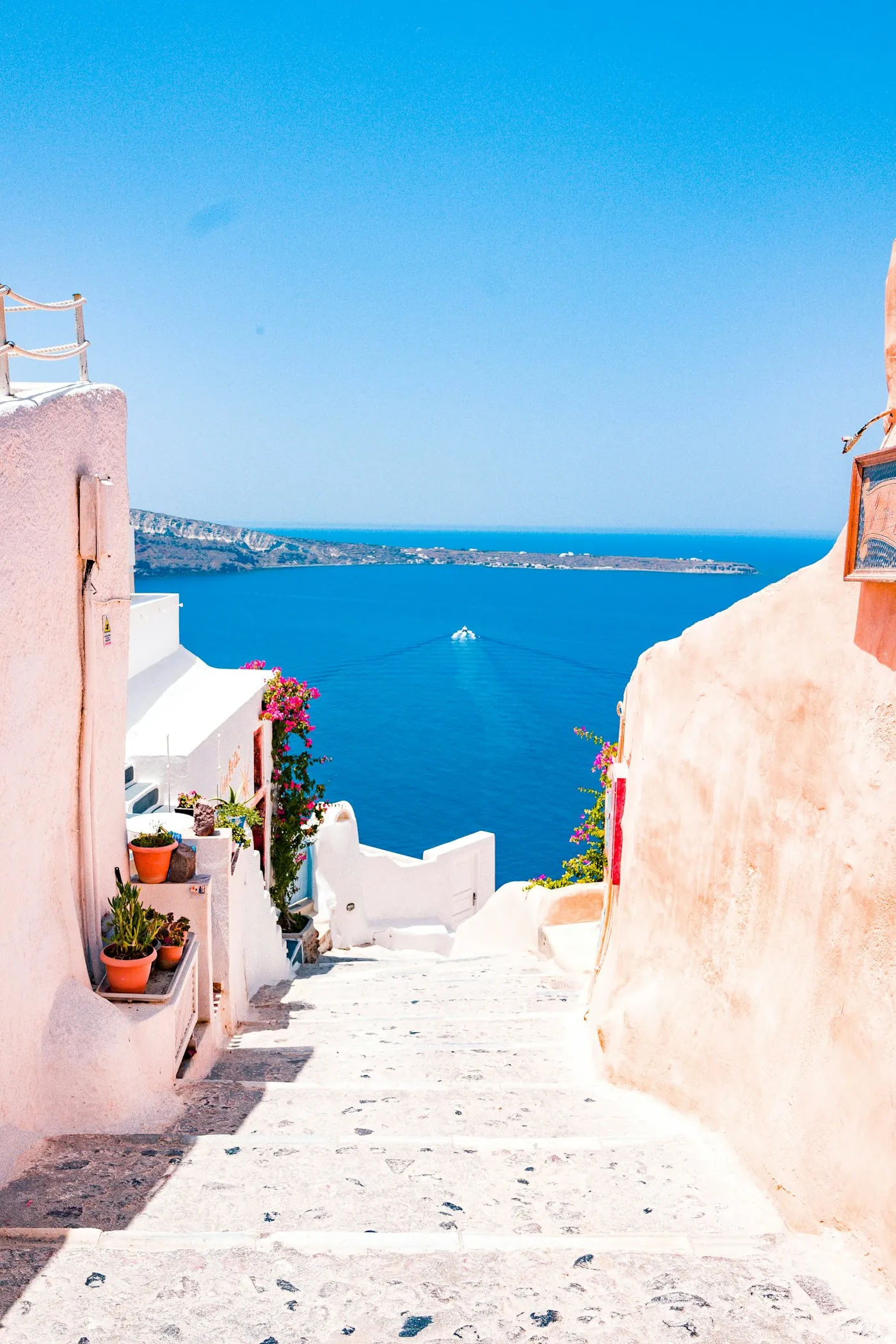 Whitewashed steps running down to the sea on Santorini