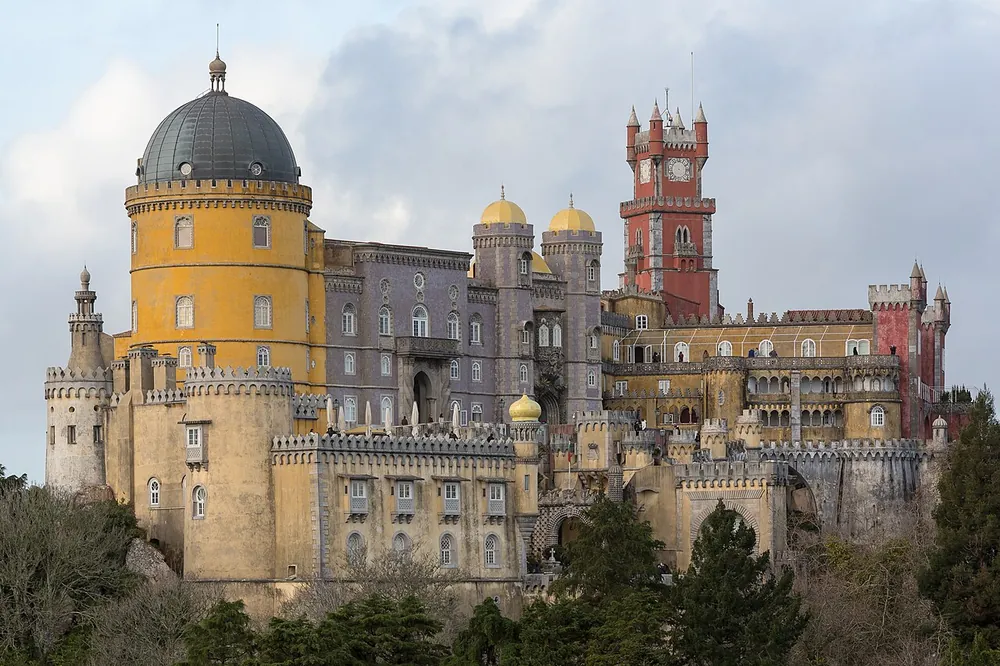 The yellow and red towers of the Palacio da Pena above Sintra