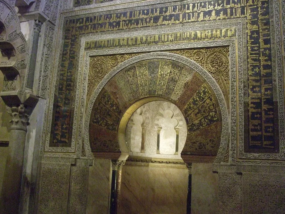 The mihrab of the Mezquita, gold mosaic over a horseshoe arch