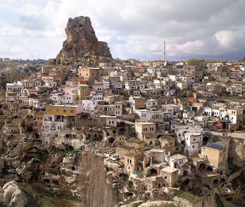 The castle rock at Uchisar above the cave houses of Cappadocia