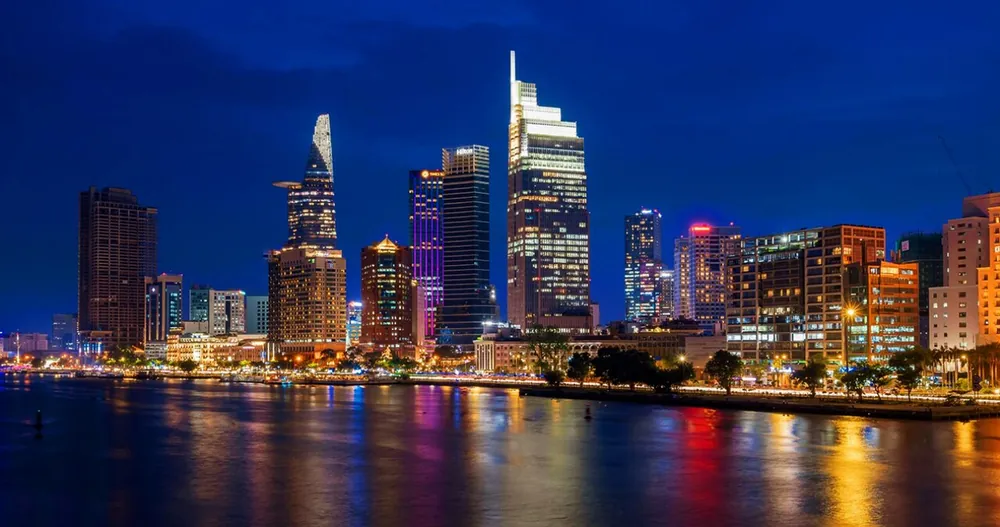 The Ho Chi Minh City skyline at night from the river